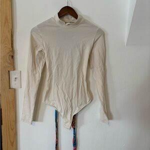 Free People cream body suit with tie back